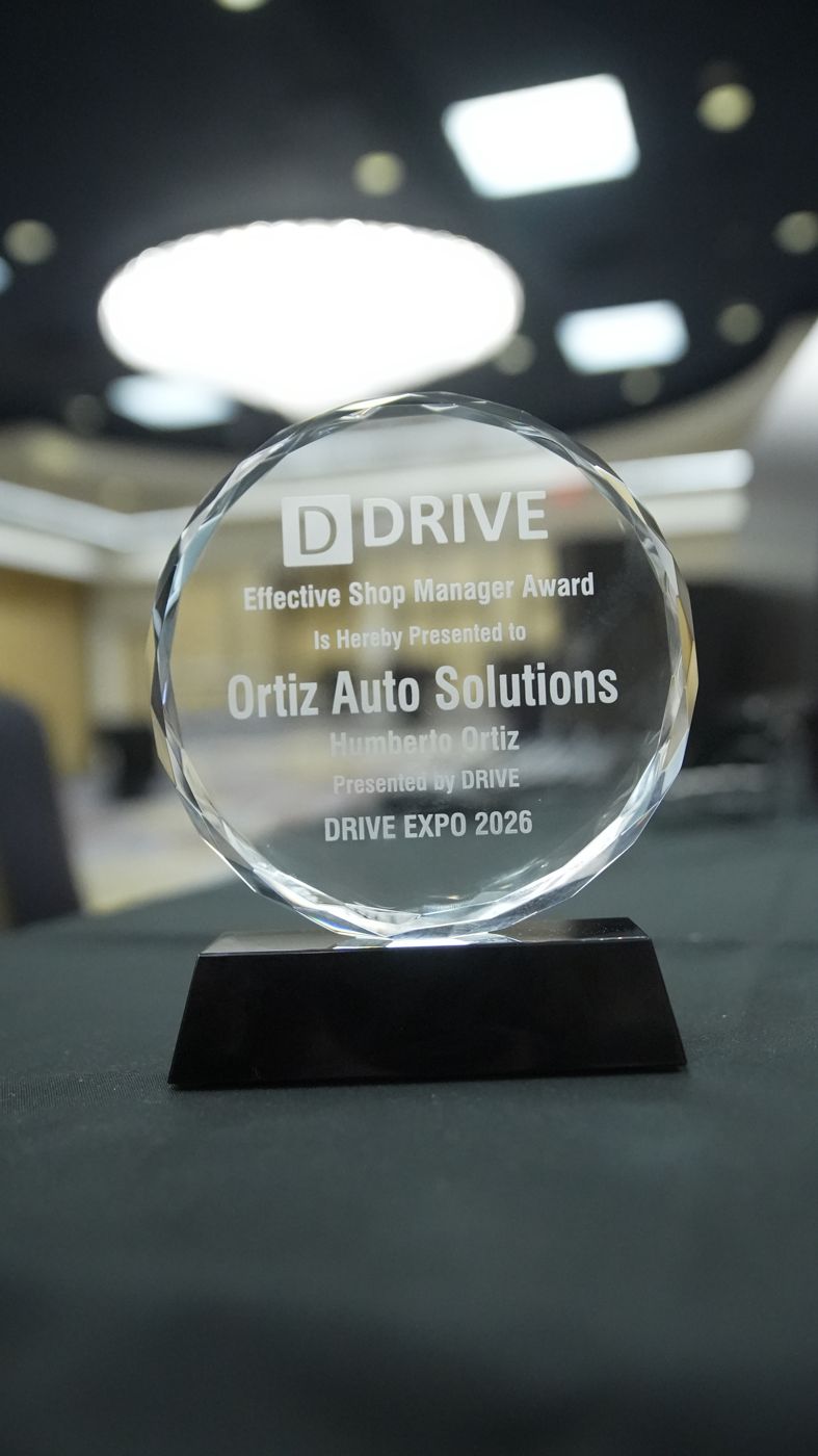 Crystal award reading DRIVE Effective Shop Manager Award, presented to Ortiz Auto Solutions, Humberto Ortiz, presented by DRIVE, DRIVE Expo 2026